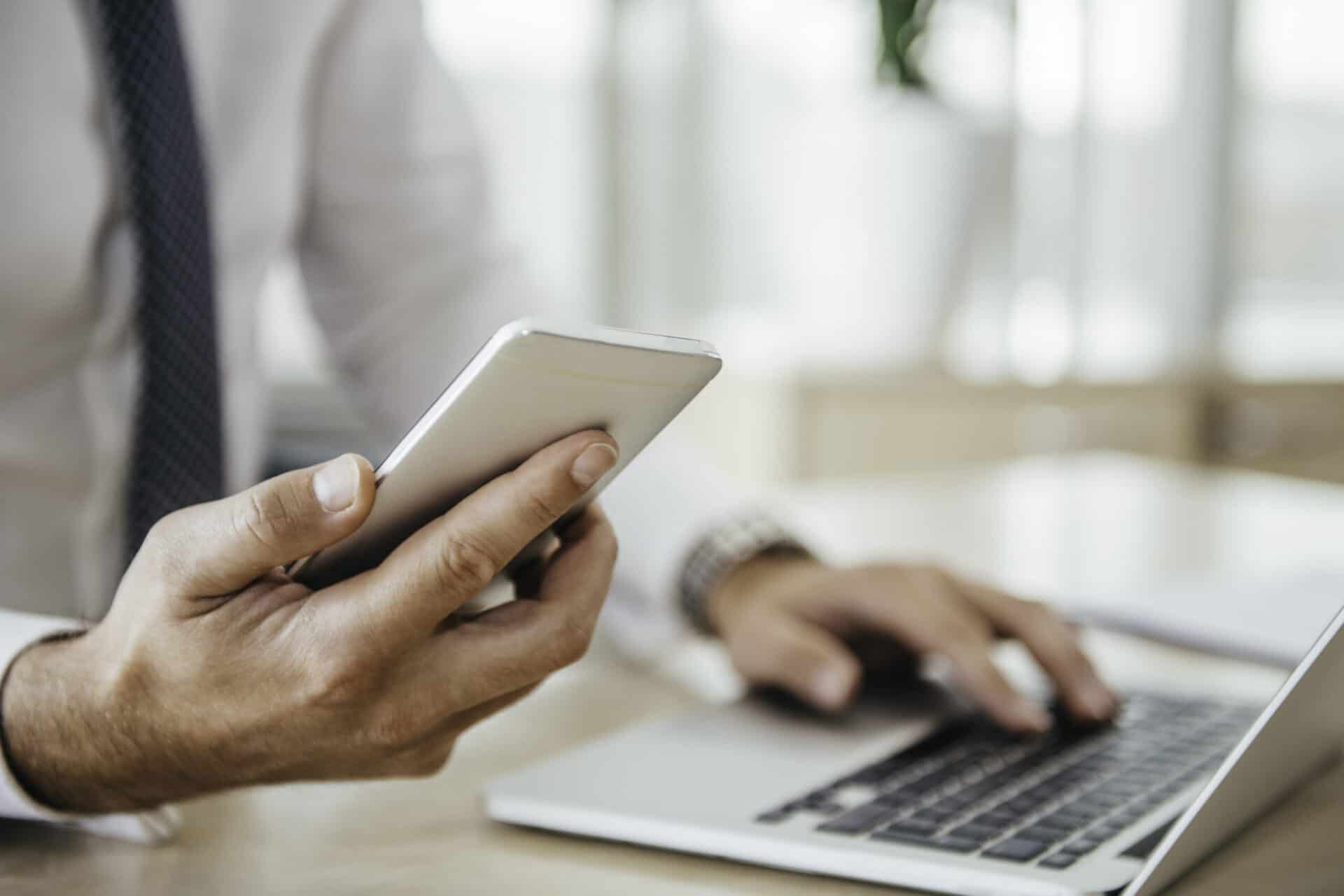 Just Six Examples of How Businesses Can Improve Communications with UCaaS 4 businessperson on phone handset customer call scaled 1